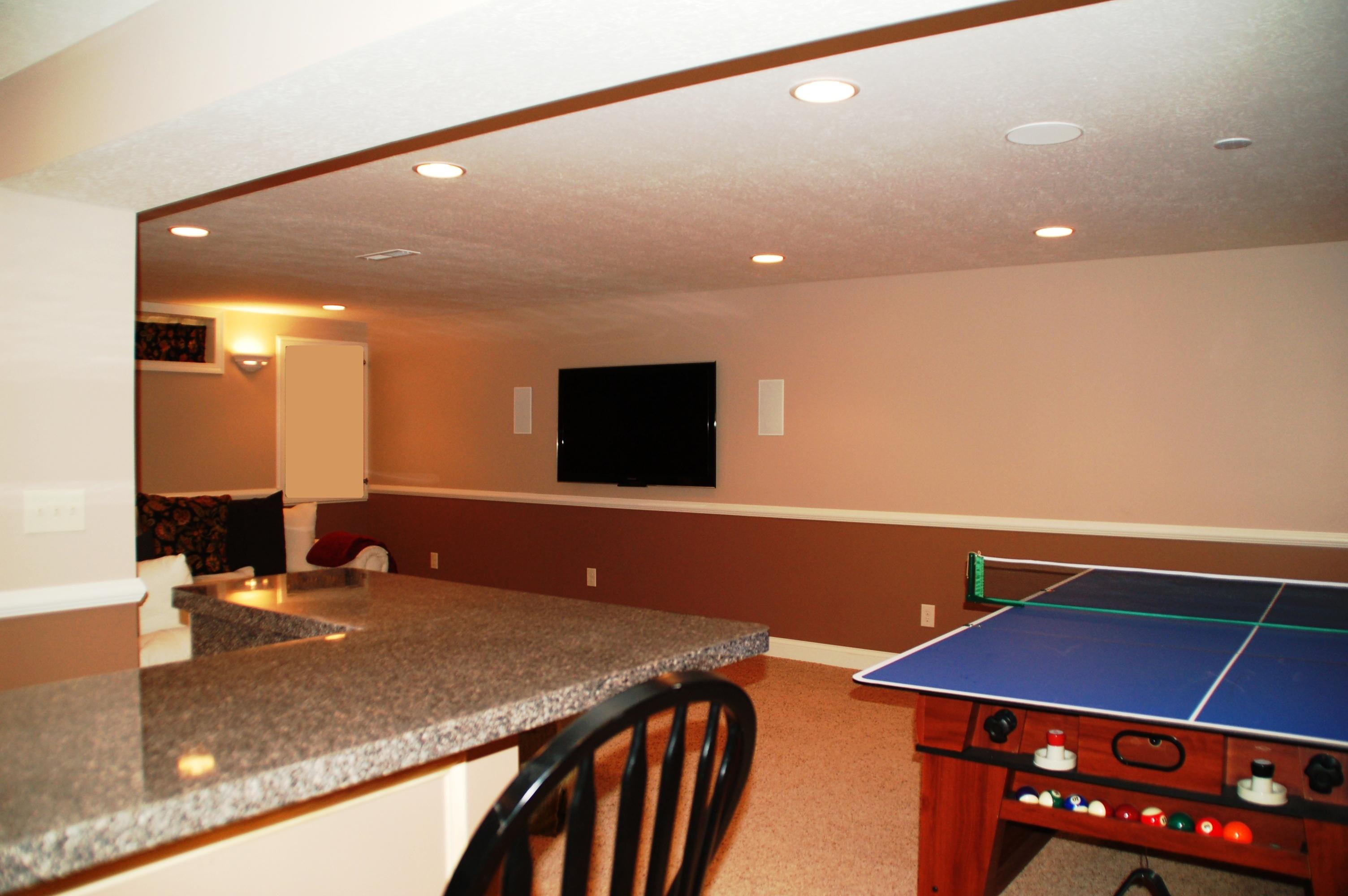 Comfortable finished basement with activity table